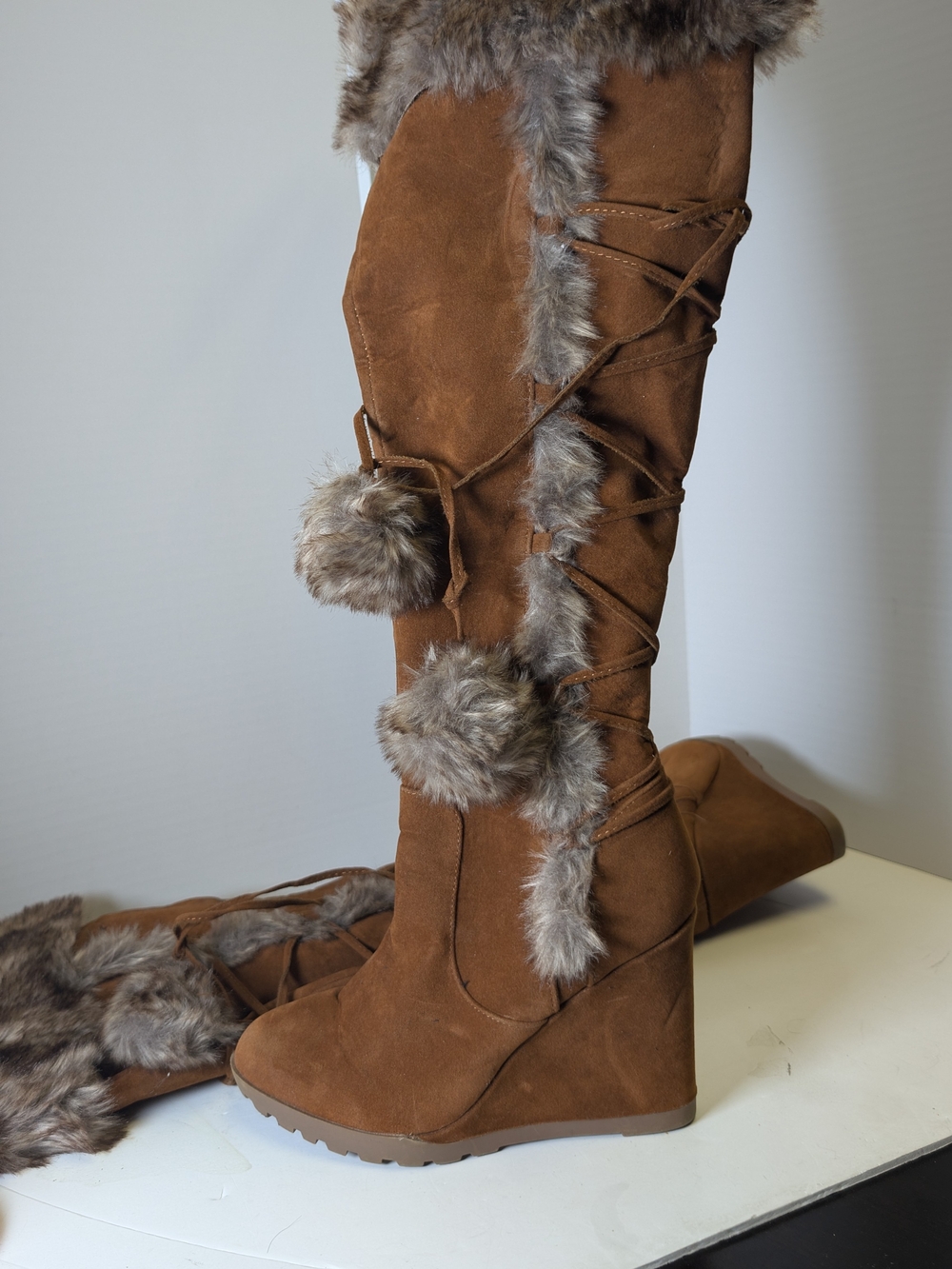 JustFab Brown Faux-Suede Wedge Knee-High Boots with Faux Fur Pom-Poms